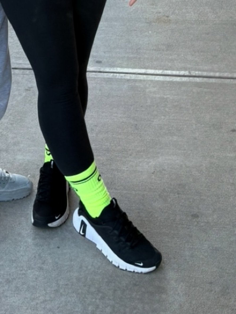 Nike Black and White Running Shoes with Swoosh Accent